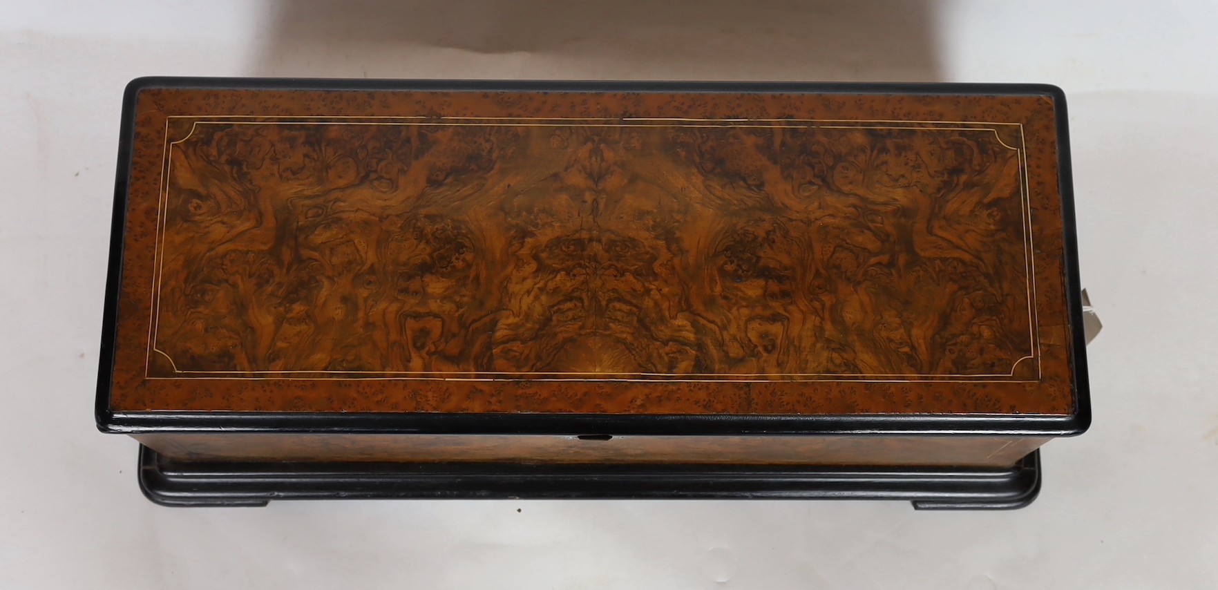 A 19th century Swiss inlaid burr walnut musical box, 73cm wide, 31cm deep, 21cm high